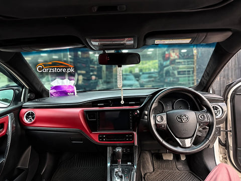 Toyota Corolla 2015-2027 carbon fiber interior kit installed on dashboard – Carzstore.pk