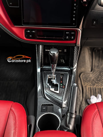 Corolla carbon fiber gear console and cup holder trim